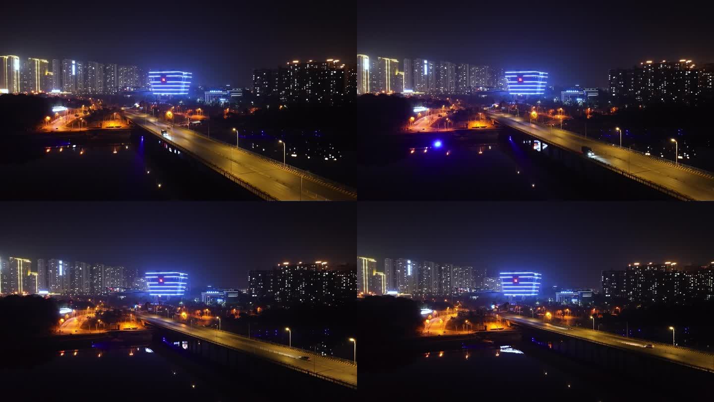 宁乡市金洲大桥创业大楼夜景车流航拍4K