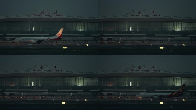 傍晚时分武汉天河机场航站楼前飞机滑行过去