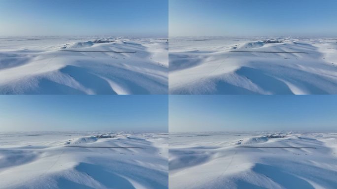 茫茫原野积雪覆盖的山坡