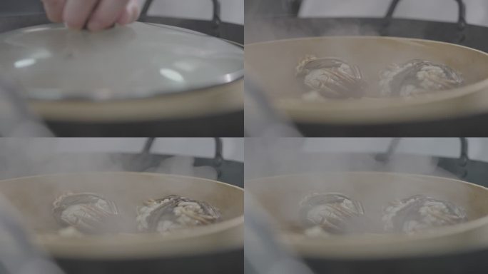 掀开锅里蒸的螃蟹