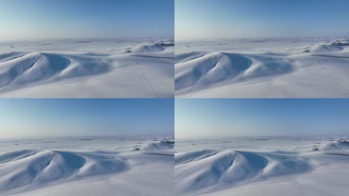 初春积雪覆盖的山坡