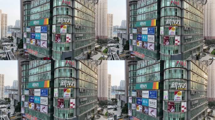 4K原素材-航拍挂满广告招牌的商务楼宇