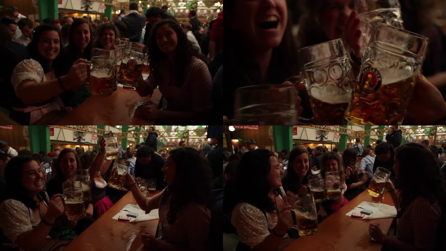 德国慕尼黑啤酒节狂欢 外国女人喝啤酒碰杯