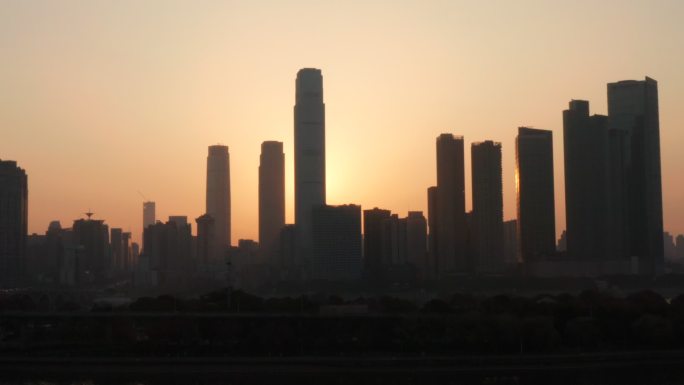 长沙国金中心CBD清晨唯美日出逆光航拍