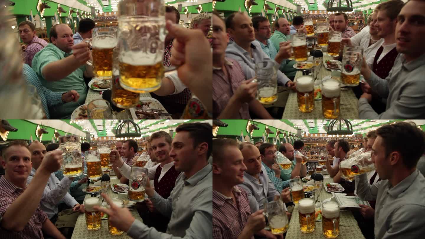 德国慕尼黑啤酒节外国人喝酒碰杯胜利手势
