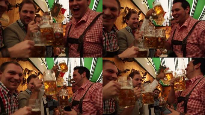 德国慕尼黑啤酒节狂欢 喝啤酒高呼碰杯