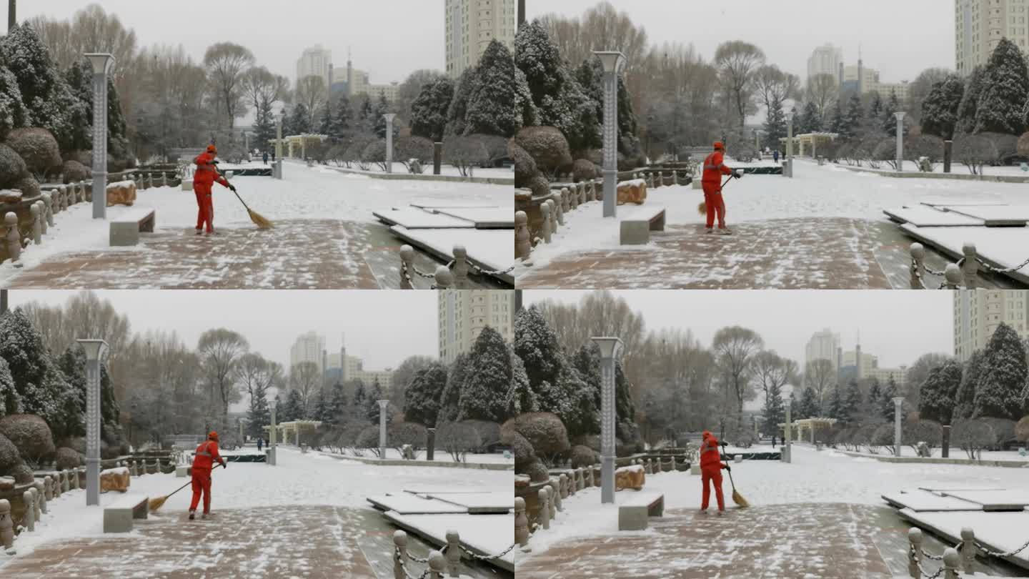 公园环卫工人在扫雪