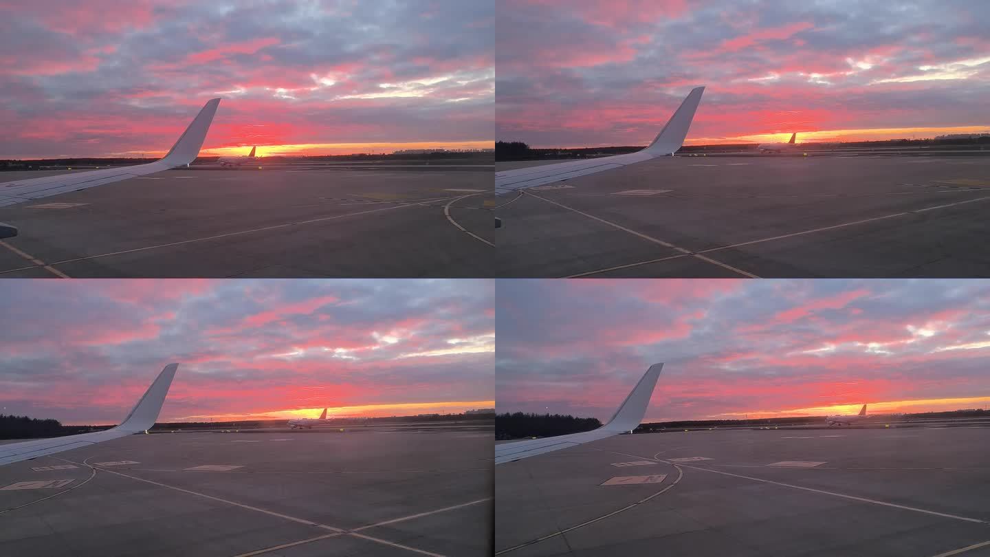 机场美丽的夕阳，夕阳飞机降落