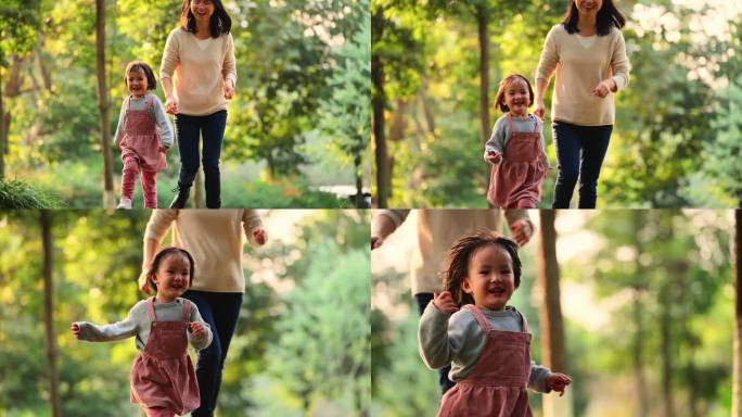 秋天公园里亲子欢乐时光妈妈追着宝宝奔跑