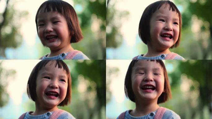 可爱小女孩公园里开心微笑特写镜头