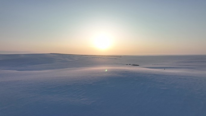 北方原野雪景日落风光