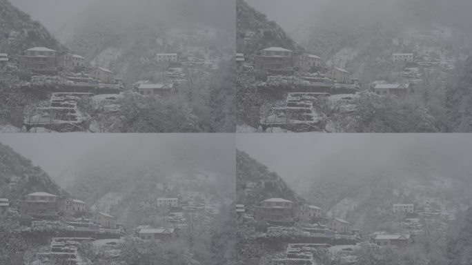 南方雪山航拍下雪天高山