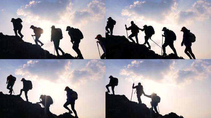 登山团队手拉手同心协力一起登山徒步登高峰