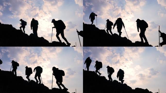 背包客登山团队登山行者爬山逆光前行人物光
