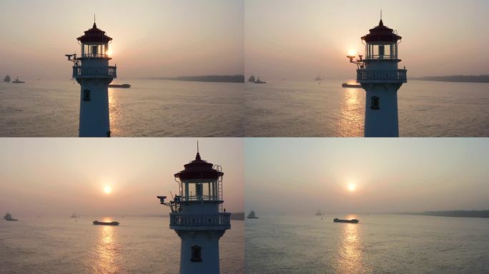 清晨日出海边灯塔唯美逆光航拍
