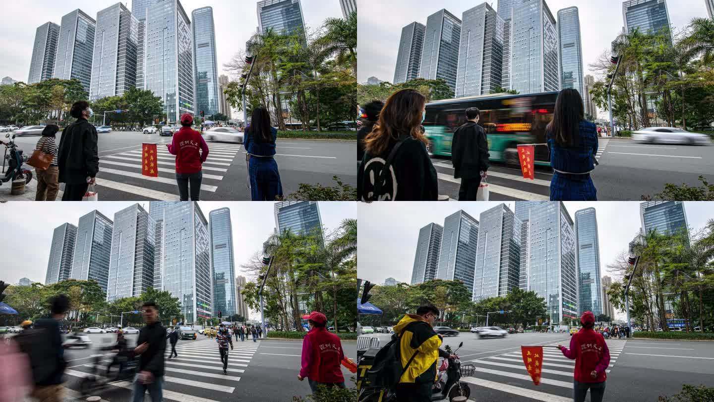 深圳南山区公科技园志愿者在指挥行人过马路