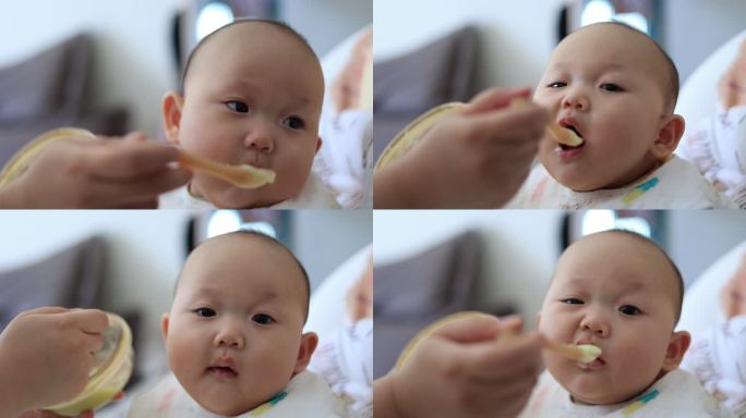 婴儿吃辅食米粉喂饭