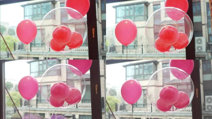 白色气球中的粉色气球
