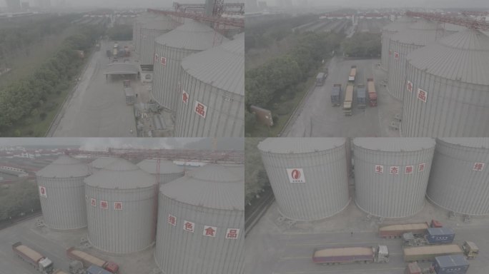 航拍工厂酒厂巨型储罐运输车俯瞰前移侧飞