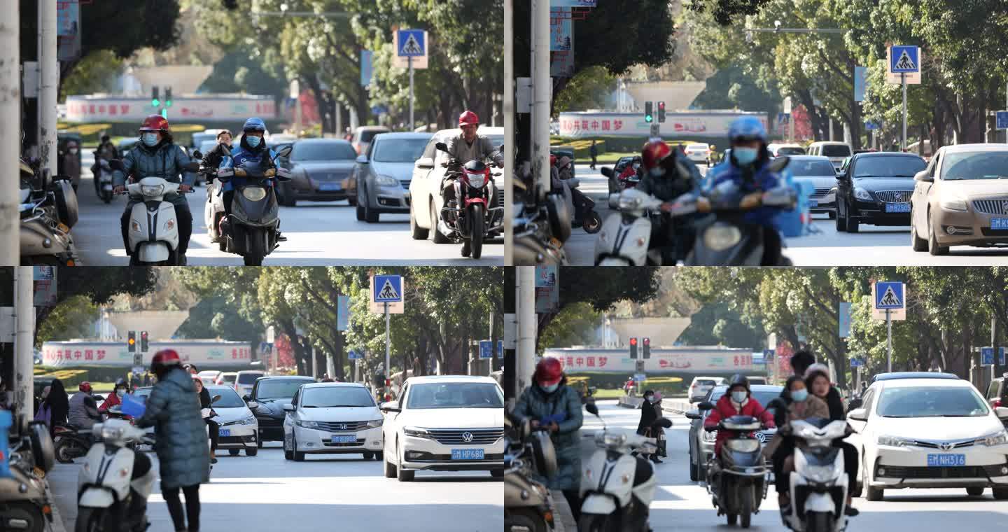 马路城市街道人轿车汽车摩托车流