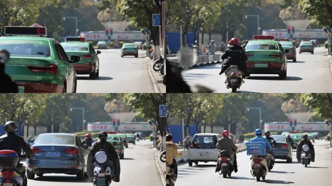 马路城市街道人轿车汽车摩托车流