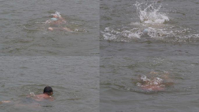 男人在江河中游泳