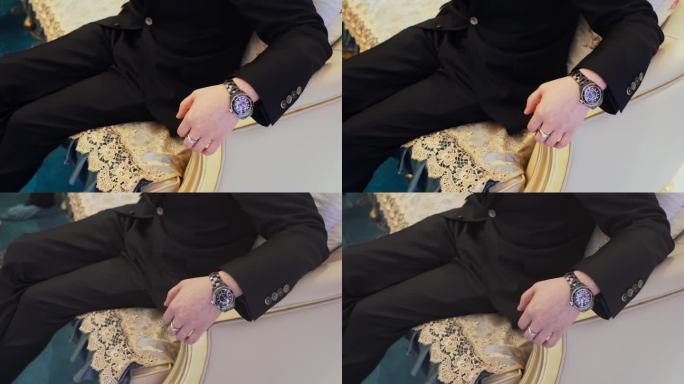 男人手上的手表和戒指