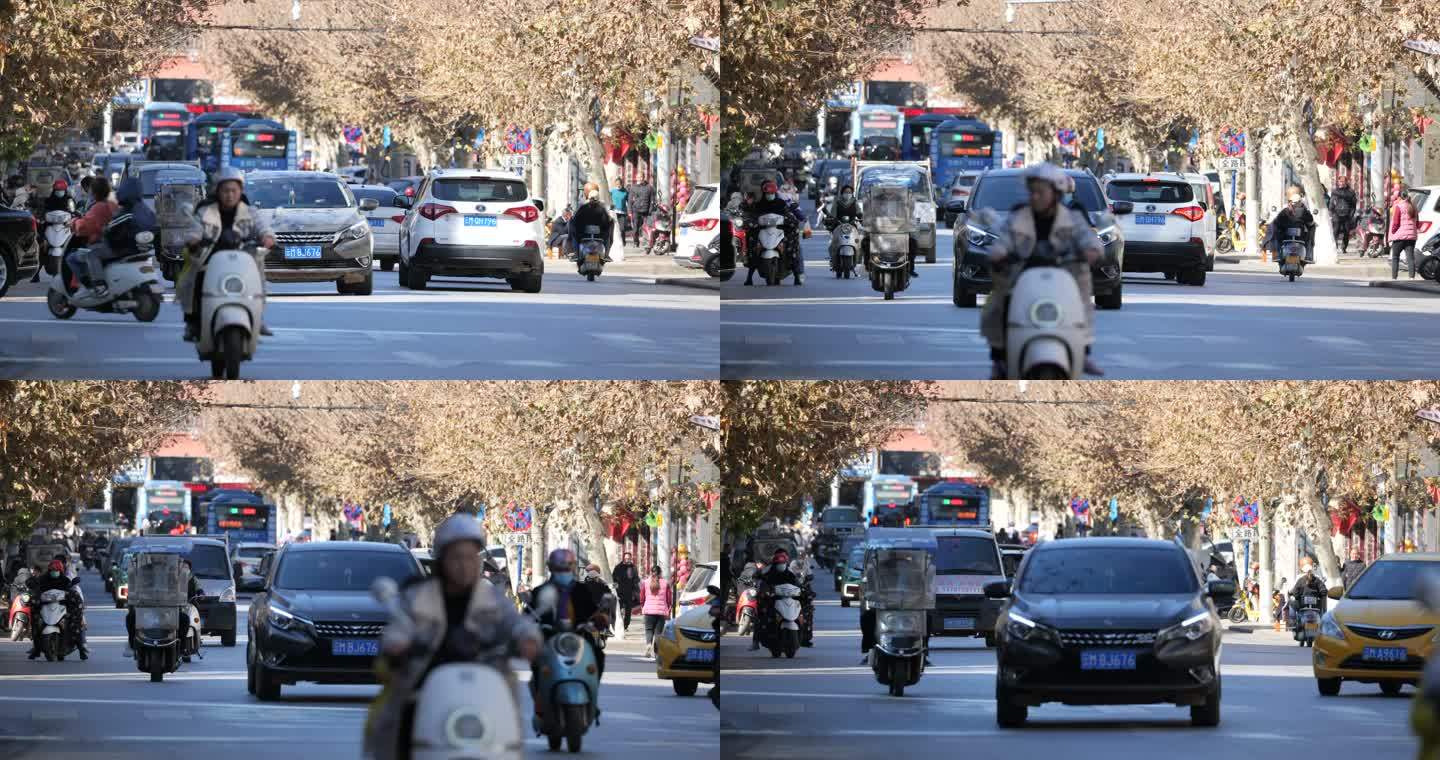 马路城市街道人轿车汽车摩托车流