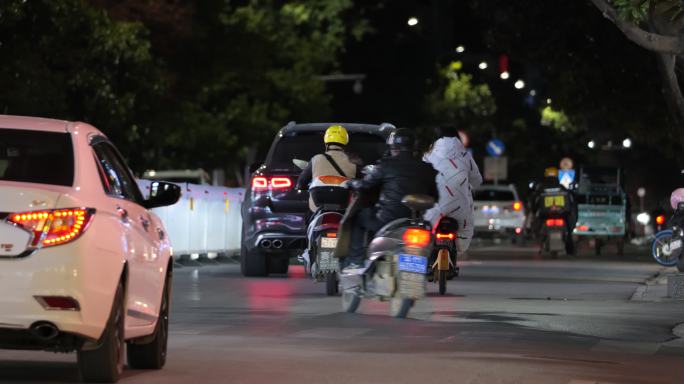 马路城市街道人轿车汽车摩托车流