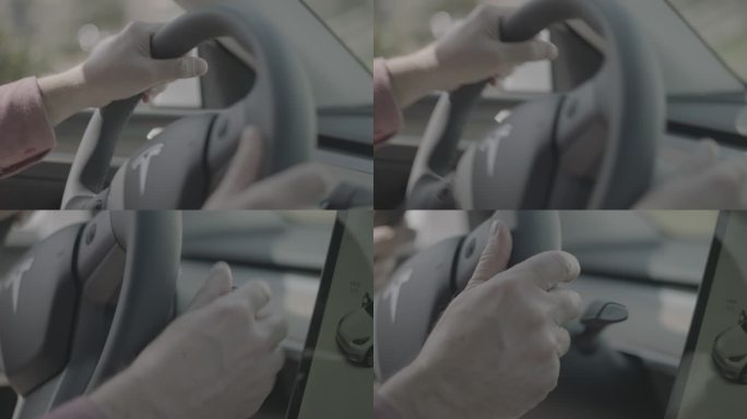 手握方向盘做出开车准备镜头