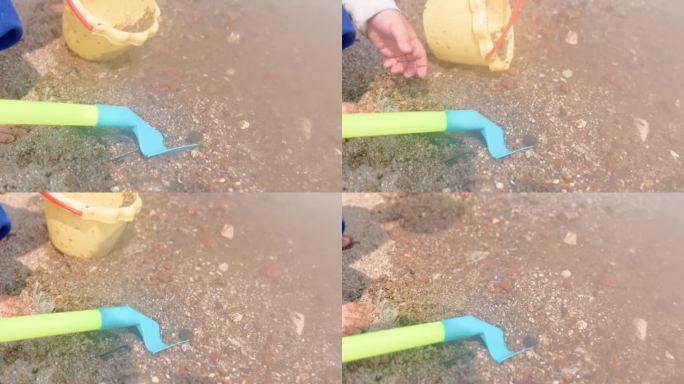 玩水玩泥沙玩耍的孩子脚步特写