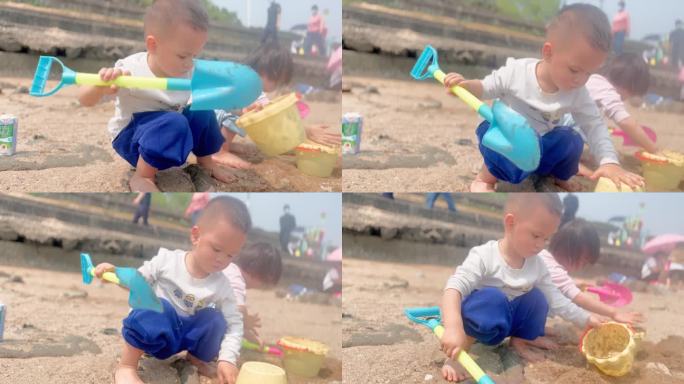 玩水玩泥沙玩耍的孩子