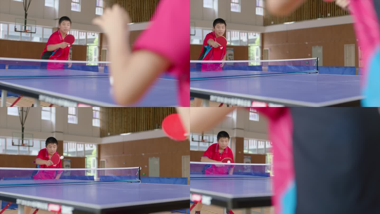 在体育馆打打乒乓球的少年