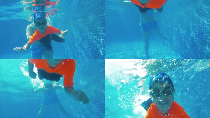 水下拍摄小男孩跳水游泳潜水练习锻炼