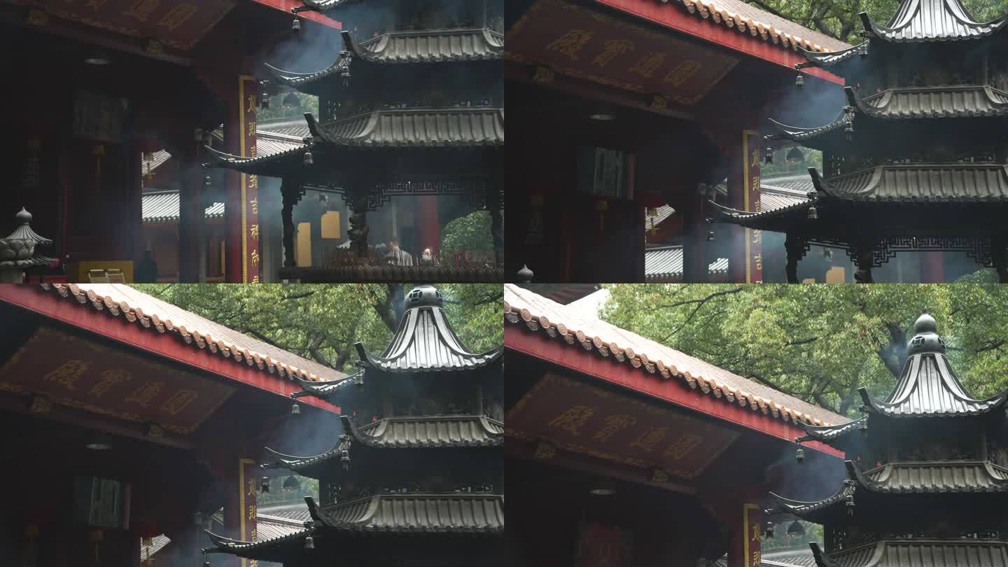 下雨天杭州寺庙大殿前的香炉青烟袅袅