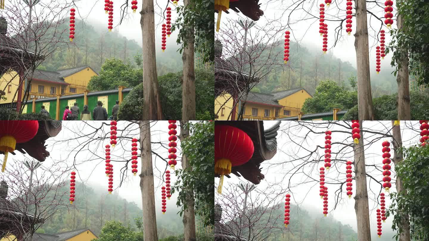 下雨天杭州上天竺寺庙树上挂着灯笼