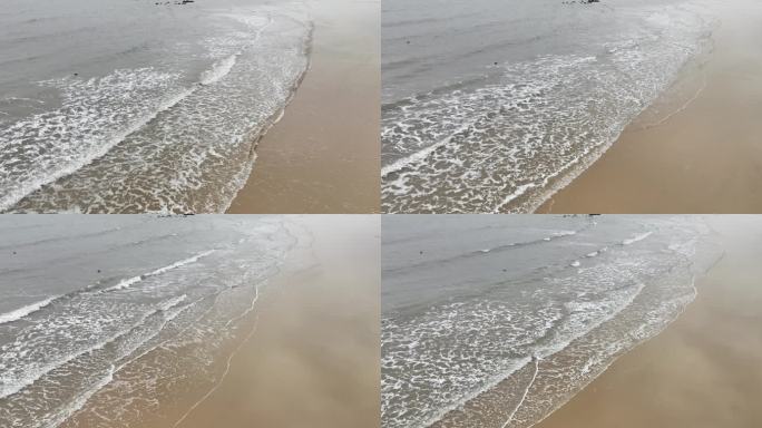 阴天大海沙滩海水波纹海浪航拍海滩浪花波浪