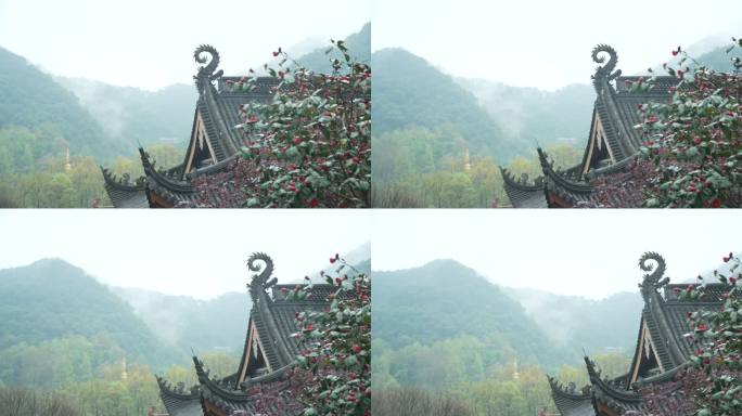 烟雨天杭州上天竺寺庙飞檐和远处的青山薄雾