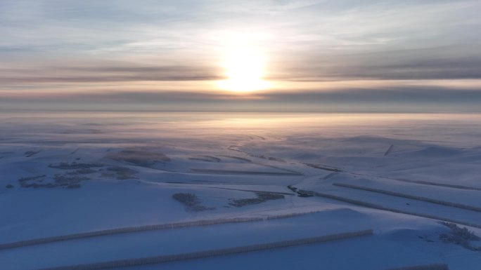 航拍4K内蒙古苍茫雪原夕照