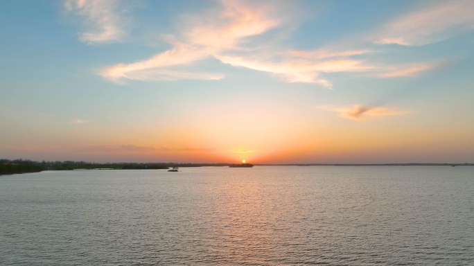 航拍单县浮龙湖国家湿地公园日出日落