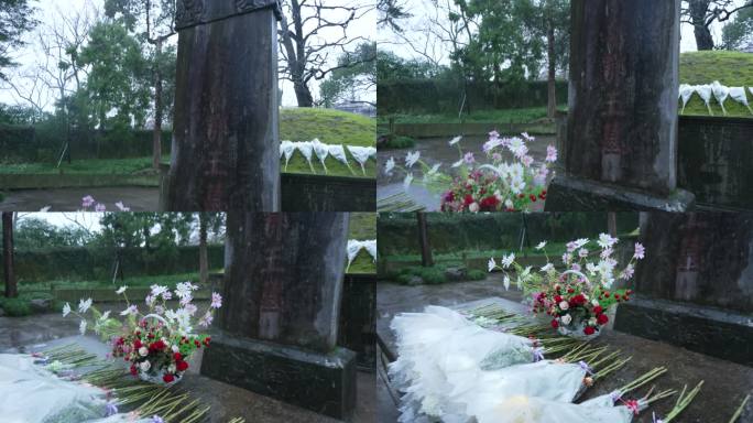 慢动作拍摄下雪天岳王庙坟墓碑前摆着鲜花