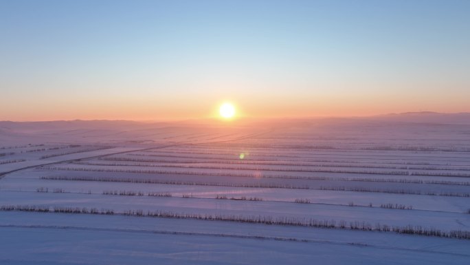 航拍4K内蒙古苍茫雪原夕照