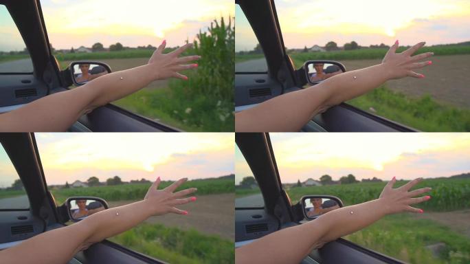 高清超级慢动作：女人的手臂伸出车外