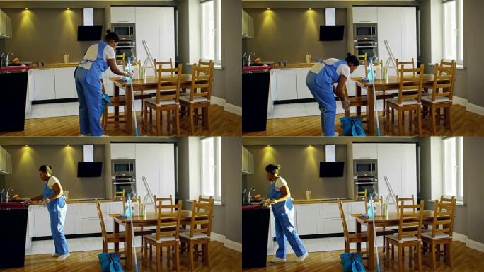 在客户厨房工作的女性清洁工