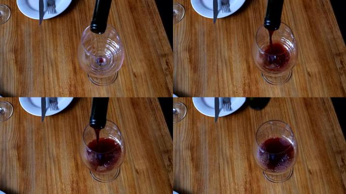 在酒杯中提供红酒的特写镜头