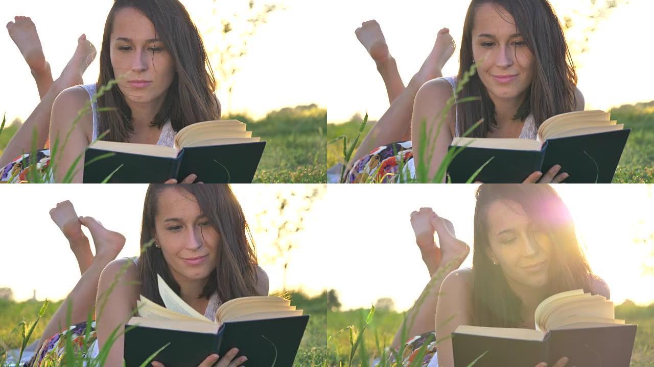 农民快乐的女孩在草地上读书显示了周围自然的幸福。