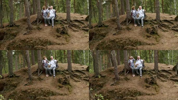 老年夫妇在森林远足中休息