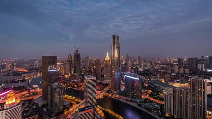 延时 -- 黎明时分天津天际线的高架视图，日夜