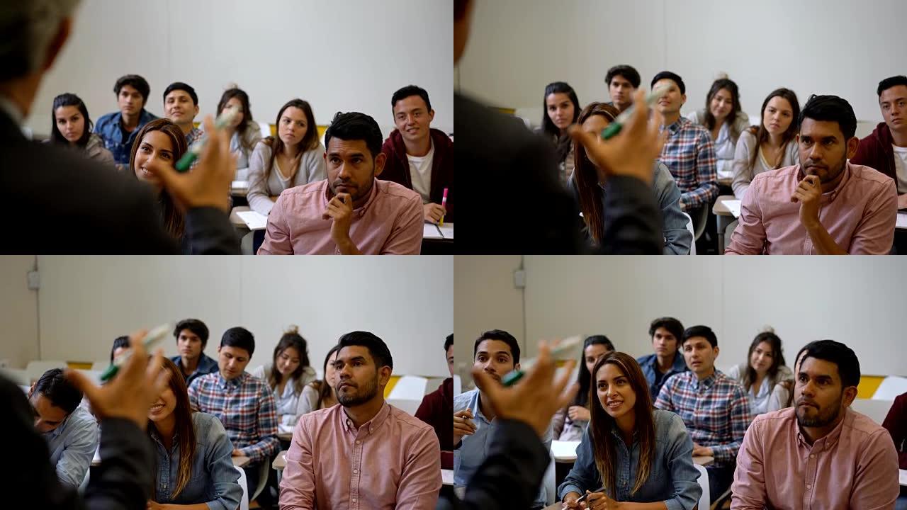 拉丁美洲的学生群体关注他们的老师，看起来有些微笑，有些专注