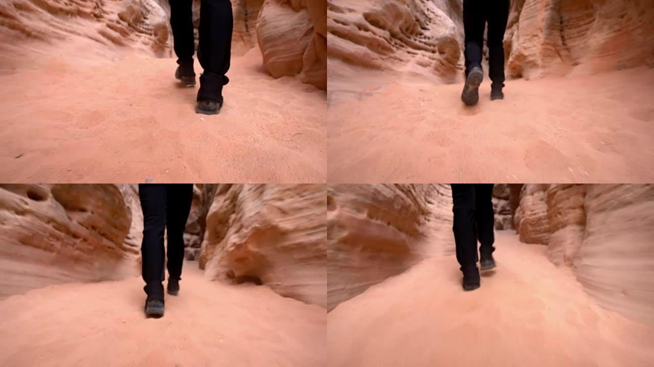 LA Man在Pariah的砂岩中行走